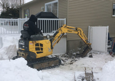 Mini excavation dans endroit restreint à Laval - Alain Fissure à Mascouche