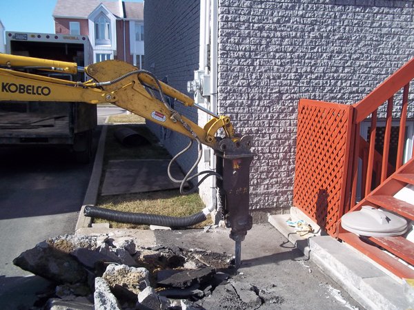 Percage du béton ( Réparation de fissure de fondation intérieur et extérieur à Mascouche ) - Alain Fissure à Mascouche