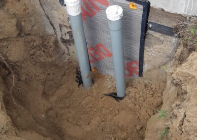 Imperméabilisation de fissure avec installation d’accès au drain pour le nettoyage futur