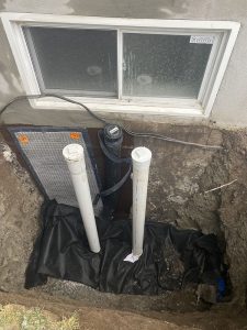 Réparation de fissures avec installations de colonne accès au drain