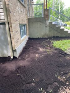 Réparation de fondation avec correction de pente négative à Laval - Alain Fissure
